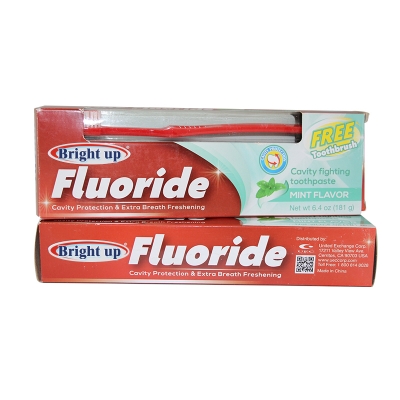 Pasta de dientes con flúor con cepillo de dientes gratis 181g